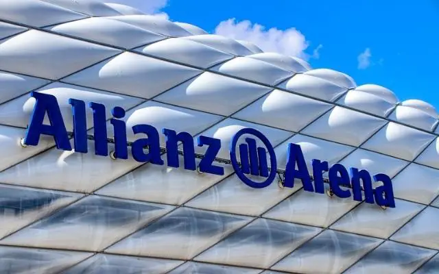 Allianz Arena where FC Bayern Munich play their homes games. Photo taken of the Allianz Arena from the outside under a blue sky with puffy white clouds