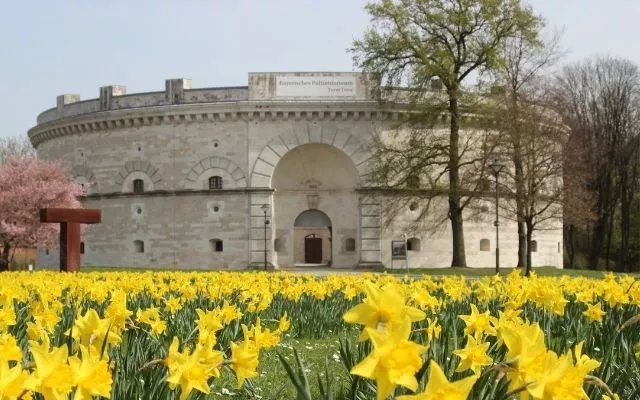 Best Cities In Bavaria Ingolstadt Round Building and Daffodils