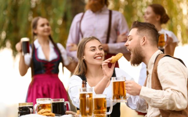 What is a Volksfest featuring people having a good time and a laugh at a beer festival