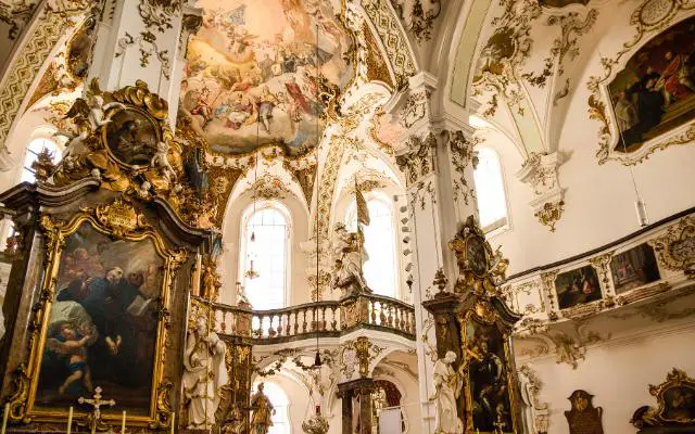 Kloster Andechs Church featuring Baroque design with many stuccos and frescos