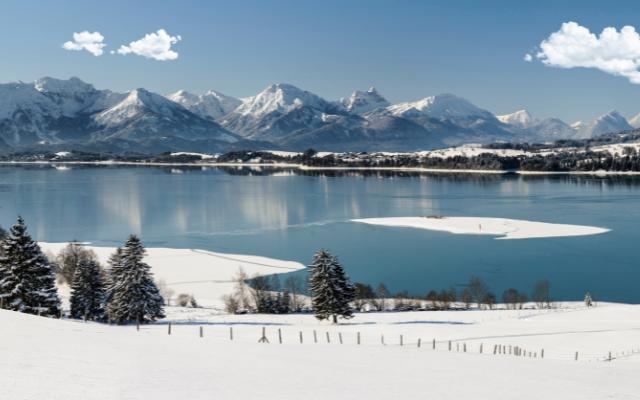 Best Lakes in Bavaria featuring the view over Lake Forggensee in winter