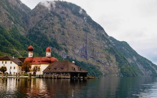 Lake Konigsee St Bartholomew Church with mountain behind
