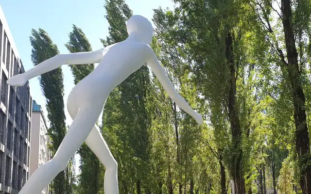 The White Walking Man Sculpture In Munich