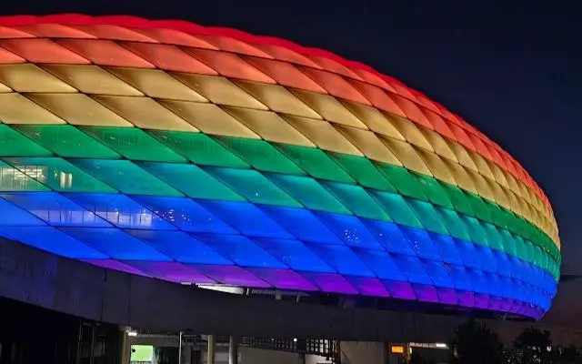 Allianz Arena Munich glowing multi colors at night