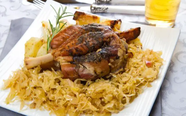 Sauerkraut Origin featuring a Schweinshaxe and Sauerkraut and potato